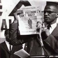 Malcolm X, then a leader in the Nation of Islam, demands respect and rights for black people.