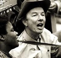Singers Odetta and Pete Seegar keep spirits high for thousands of demonstrators of all races camped in Washington DC in the Poor People's Campaign, 1968