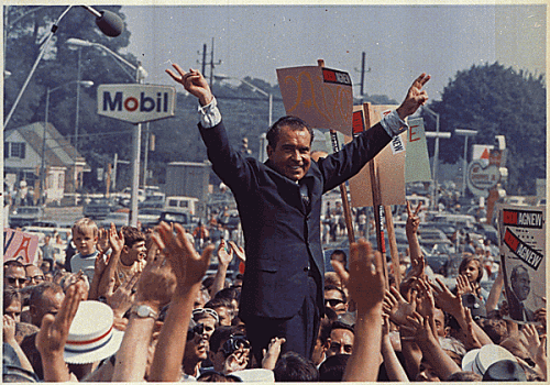 richard_nixon_campaign_rally_1968 Richard Nixon, campaigning for president at a rally in 1968, gives his iconic "victory" sign.