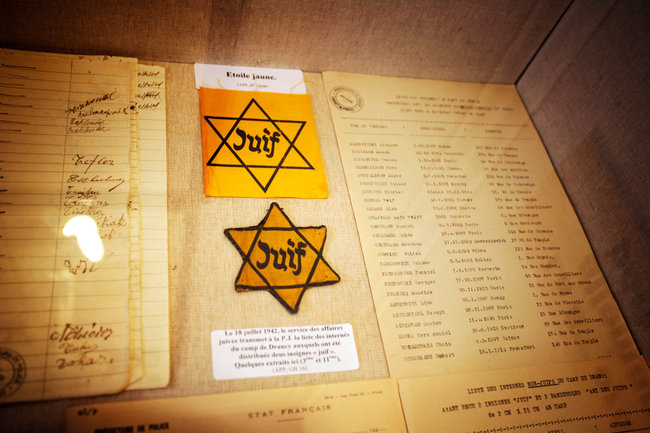 Yellow Stars in French exhibit French Jews had to wear yellow stars during the German occupation of France.