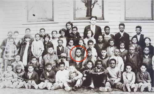 James Cameron, also known as "Jim" to his sisters and "Apples" to his classmates, in school picture. Courtesy of the Cameron Family.