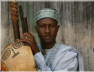 Griot with kora Griot with kora