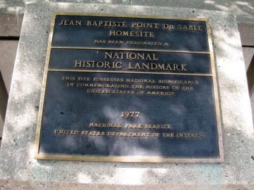 Jean_Baptiste_Point_Du_Sable_Homesite_(7177758767) Jean Baptiste Point Du Sable's home has since been been recognized as an historic landmark (Teemu008 from Palatine, Illinois, CC BY-SA 2.0, via Wikimedia Commons)