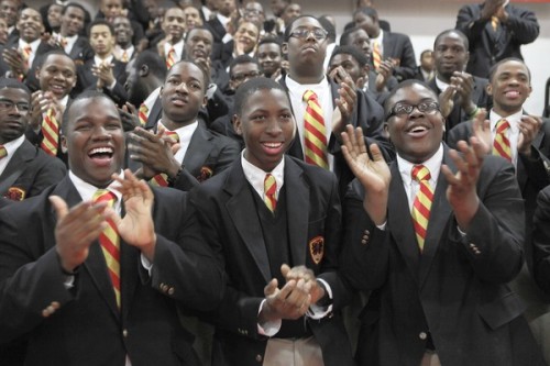 Urban Prep Academy students cheer on their classmates during last year's assembly. (Nancy Stone, Chicago Tribune / February 16, 2011)