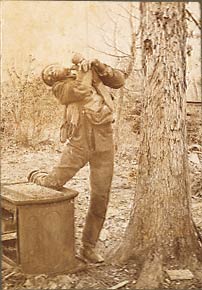 Souvenir Postcard of Lee Hall, lynched in a trash dump in Wrightsville, Georgia. His ears were cut off, and his body riddled with bullets. Inscription on reverse in brown ink: "Lee Hall col, lynched Saturday Feb, 7th 1903 about 11 o'clock P.M."