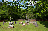 The graves of family members are marked in Coffee Cemetery in Florence, Ala., but those of their slaves are not.