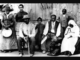 Harriet Tubman, "The Conductor," with fugitive slaves in Underground Railroad station Harriet Tubman, "The Conductor," with fugitive slaves in Underground Railroad station