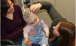 UMass researcher fits baby subject with sensors