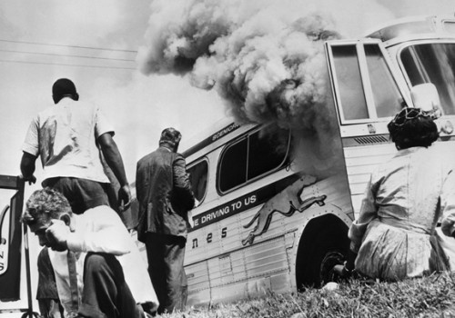 A Greyhound bus carrying Freedom Riders is firebombed