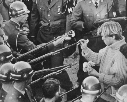 Anti-Vietnam War protesters faced National Guard guns with flowers.