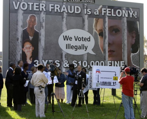 Matt Brusky, with Citizens Action of Wisconsin, joins other community leaders to object to what they say are billboards that suppress the vote. They were gathered at a billboard at 22nd and Morgan to make their announcement, Tuesday, October 12, 2010.  Rick Wood/RWOOD@JOURNALSENTINEL.COM