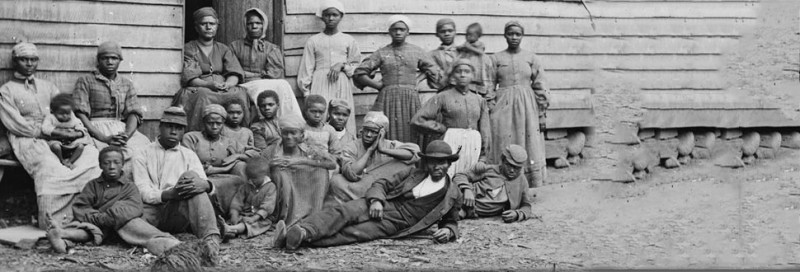 photo of slaves by their quarters