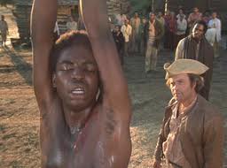 Roots (1977), based on the book by Alex Haley, was a much-viewed dramatic tv series. It traced Haley's family line from ancestor Kunta Kinte's enslavement to his descendants' liberation.