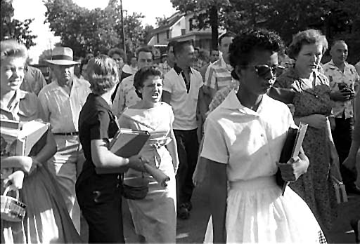Elizabeth Eckford, one of the nine students who integrated Central High in Little Rock AR, walked through an angry white mob shouting epithets.