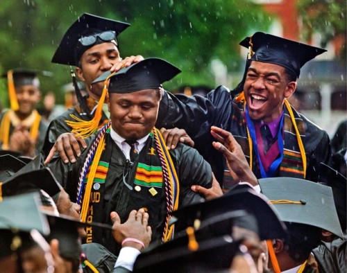 Leland Shelton is congratulated as he is acknowledged by President Obama in Sunday's Morehouse College commencement address. After a difficult childhood, Mr. Shelton graduated Phi Beta Kappa and is headed to Harvard Law School. (Associated Press)