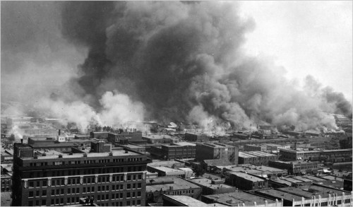 Flourishing businesses burn during the riot. The area was completely decimated. (Tulsa Historical Society)