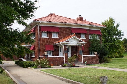 Homes of African Americans burning during the race riot. Courtesy of the Tulsa Historical Society.)