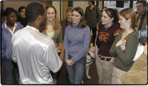 ABHM Head Griot, Reggie Jackson, talks with students about American history.