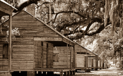 The "quarters" where slaves were housed on the plantation.