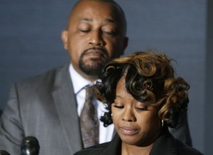 Monica McBride and Walter Ray Simmons, the parents of Renisha McBride address the media during a news conference in Southfield, Mich., Friday, Nov. 15, 2013. Their daughter was shot on Nov. 2 in the face on Theodore P. Wafer's front porch in Dearborn Heights. (AP Photo/Carlos Osorio)