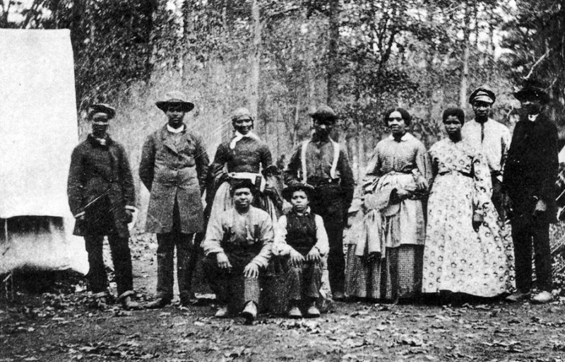 "Contrabands": Runaway slaves in Virginia working for the 13th Massachusetts Infantry.