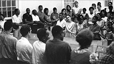 Civil rights workers in Mississippi singing "We Shall Overcome."