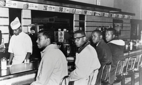 02 Feb 1960, Greensboro, North Carolina, USA --- Four African American college students sit in protest at a whites-only lunch counter during the second day of peaceful protest at a Woolworth's in Greensboro, North Carolina. From left: Joseph McNeil, Franklin McCain, Billy Smith, and Clarence Henderson. --- Image by © Jack Moebes/CORBIS