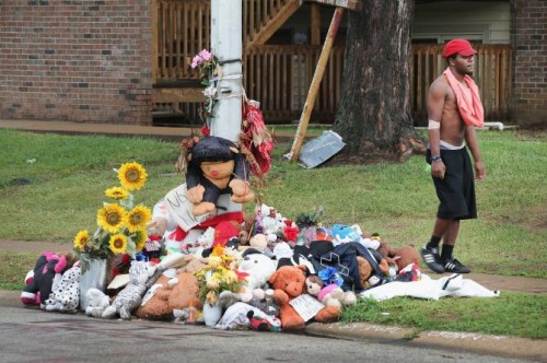 A rain-soaked memorial on Sept. 10, 2014, at the location in Ferguson, Mo., where teenager Michael Brown was shot and killed by police Officer Darren Wilson in August.  SCOTT OLSON/GETTY IMAGES