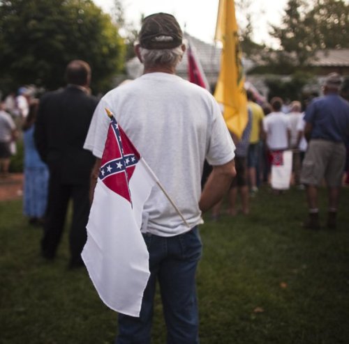 When and where is it OK to display the "Ole Stars and Bars"? (Courtesy of Sam Dean/The Roanoke Times, via AP)