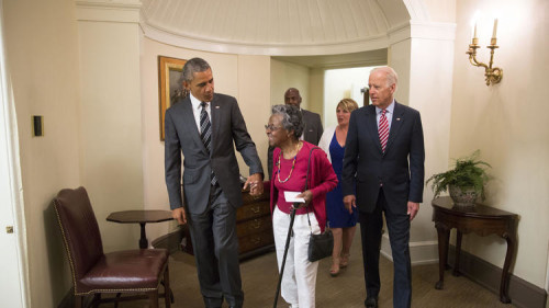 President Barack Obama welcomes Vivian Bailey, accompanied by Vice President Joe Biden, to the Whits House.
