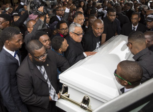 BALTIMORE, MD - APRIL 27:  Pallbearers carry the casket of Freddie Gray to the hearse after his funeral service at New Shiloh Baptist April 27, 2015 in Baltimore, Maryland. Gray, 25, was arrested for possessing a switch blade knife April 12 outside the Gilmor Homes housing project on Baltimore's west side. According to his attorney, Gray died a week later in the hospital from a severe spinal cord injury he received while in police custody.  (Drew Angerer/Getty Images)