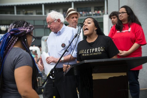 Using a controversial tactic , the Black Lives Matter movement disrupted the speech of presidential candidate Bernie Sanders in August 2015. (Photo: Alex Garland)
