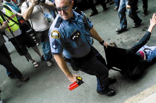 Sgt. Rothecker arrests a protester at the 2008 Republican Convention in St. Paul, MN