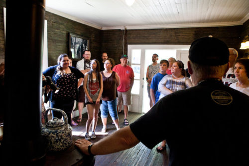 Visitors to the Jack Daniel’s distillery. Only recently has the company begun to embrace the story of Nearis Green, the enslaved man from whom Daniel learned to make his great whiskey. Credit Nathan Morgan for The New York Times 