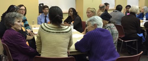Maria Cunningham (center) listens intently to a group member during "Hidden History," ABHM's 2015 film/dialogue series.