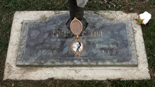 A photo of Emmett Till is seen on his grave marker Friday, Aug. 26, 2005, in Alsip, Ill. (AP Photo/M. Spencer Green)
