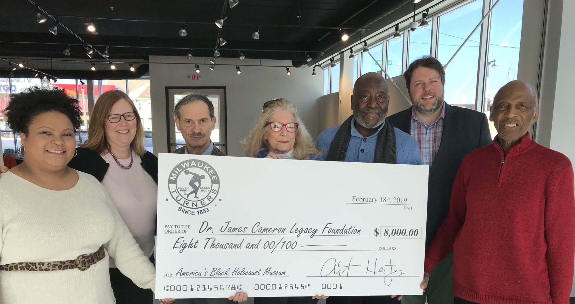 ABHM was thrilled to receive this very generous donation from the Milwaukee Turners, one of the oldest civic organizations in Milwaukee. L-R: Cydney Hargro, ABHM; Nancy Ketchman, ABHM; Art Heitzer, President of Milwaukee Turners, Patricia Obletz, Turner member; Virgil Cameron, son of Dr. Cameron and museum board member; Nicholas La Joie, Executive Director, Milwaukee Turners; and Reuben Harpole, museum board member.