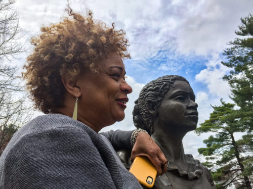JerriAnne Boggis, executive director of the Black Heritage Trail of New Hampshire, poses with a monument that was erected in Harriet E. Wilson's honor. Boggis says when she read Wilson's book, she felt as if it was written the book just for her.
Jack Rodolico /New Hampshire Public Radio