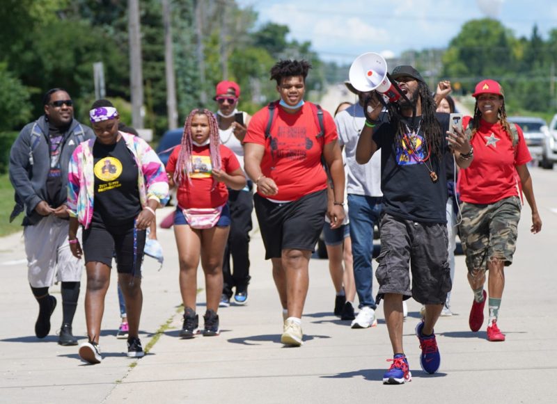 Milwaukee protest leader Frank Sensabaugh starts his march with supporters to Washington, D.C.