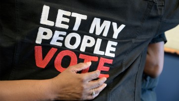 Let My People Vote A shirt with the words "LET MY PEOPLE VOTE" in bold text.