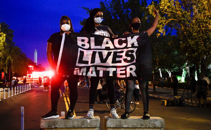 protesters with BLM flag