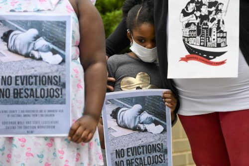 A picture of protesters against evictions during the pandemic. 