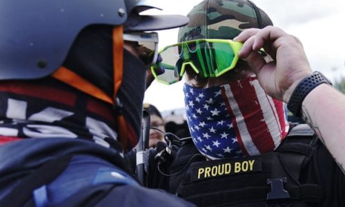 A member of the Proud Boys, right, stands in front of a counter-protester as right-wing demonstrators rally on Saturday in Portland, Oregon. Photograph: John Locher/AP