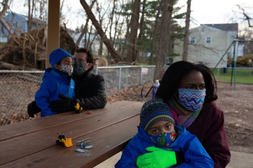 Jenn Ponder and Daniel Hertzberg have been strict with their pandemic quarantine protocol because 5-year-old twins Isaac and Lincoln have asthma, along with their mother. Credit...Jon Henry for The New York Times.