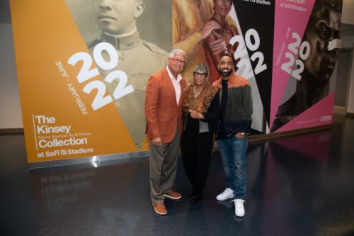 e25f63ed-f562-4ea1-856a-b7806e0aec07 (Left to right) Bernard, Shirley, and Khalil Kinsey pose at the Kinsey Collection on display at SoFi Stadium. (Adam Pantozzi/SoFi Stadium)