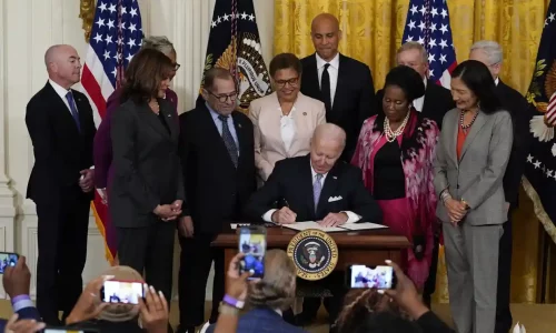 5147 President Biden signs an executive order on police reform in the East Room of the White House. (Alex Brandon/AP)
