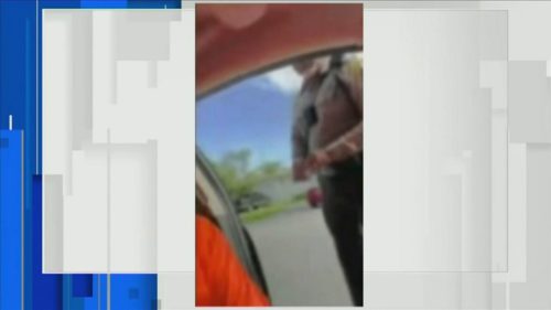 A Miami Dade officer points at Nicolas during a traffic stop on June 15th. (WPLG/GERARDSON NICOLAS/CNN/CNN NEWSOURCE)