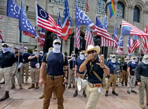 The Patriot Front speeks in front of the Boston Public Library as they march through the city of Boston on July 2. (Stuart Cahill/MediaNews Group/Boston Herald/Getty Images)

