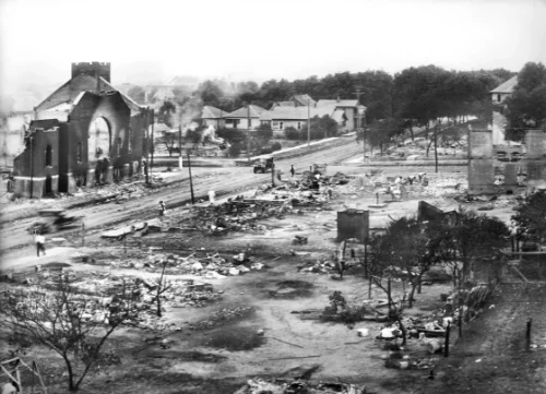 220915-tulsa-race-massacre-mjf-1553-82b74e Burned remains of the Greenwood District after the Tulsa Race Massacre in Tulsa, Okla., in June 1921. (GHI/Universal History Archive/Universal Images Group via Getty Images file)