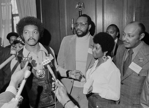 Aretha Franklin with the Rev. Jesse Jackson at the Operation PUSH Soul Picnic in 1972. (Jim Wells/AP)